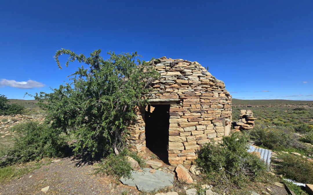 A corbelled house from the Karoo with a blue sky